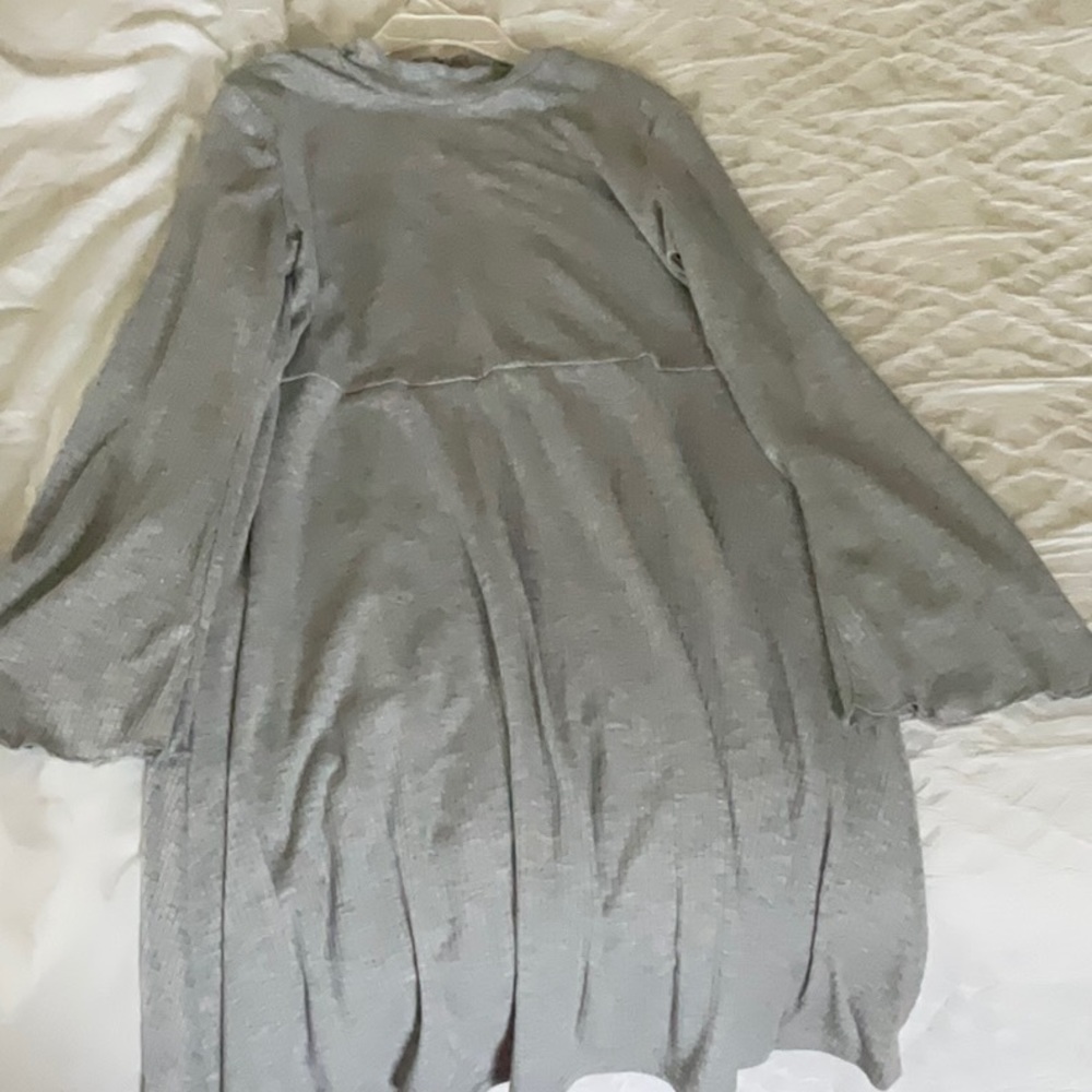 This is a grey kids dress that is a size L/G